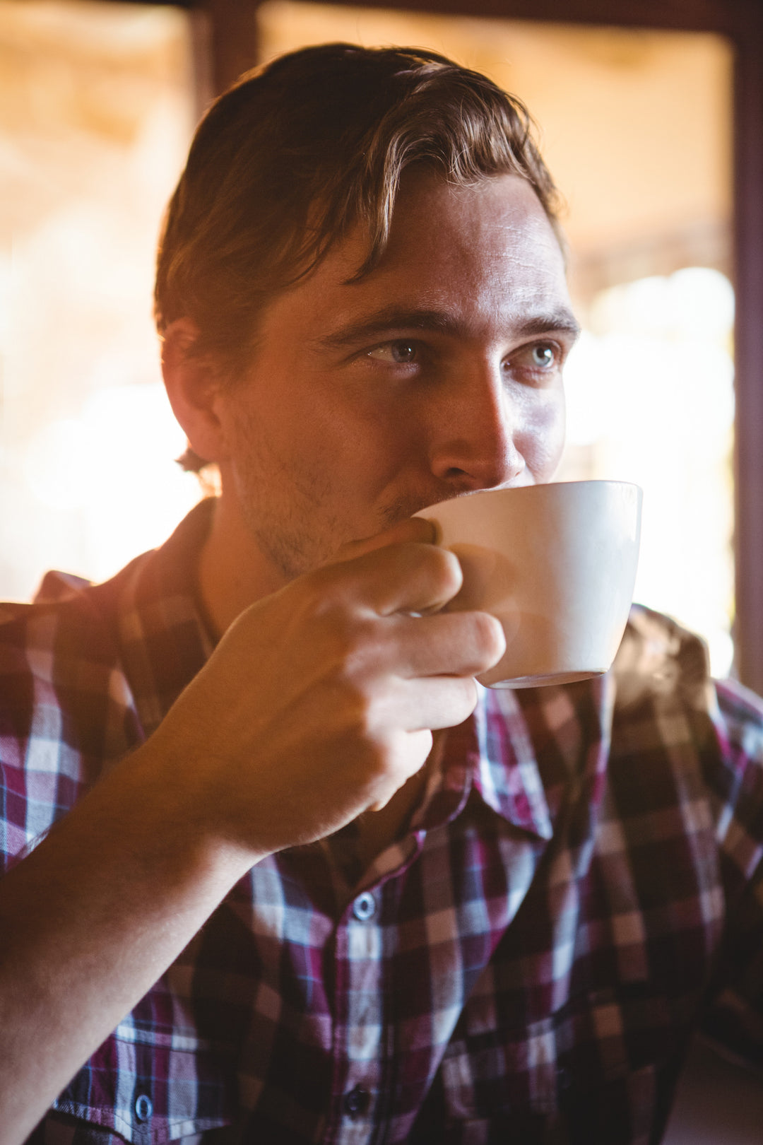 man drinking coffee